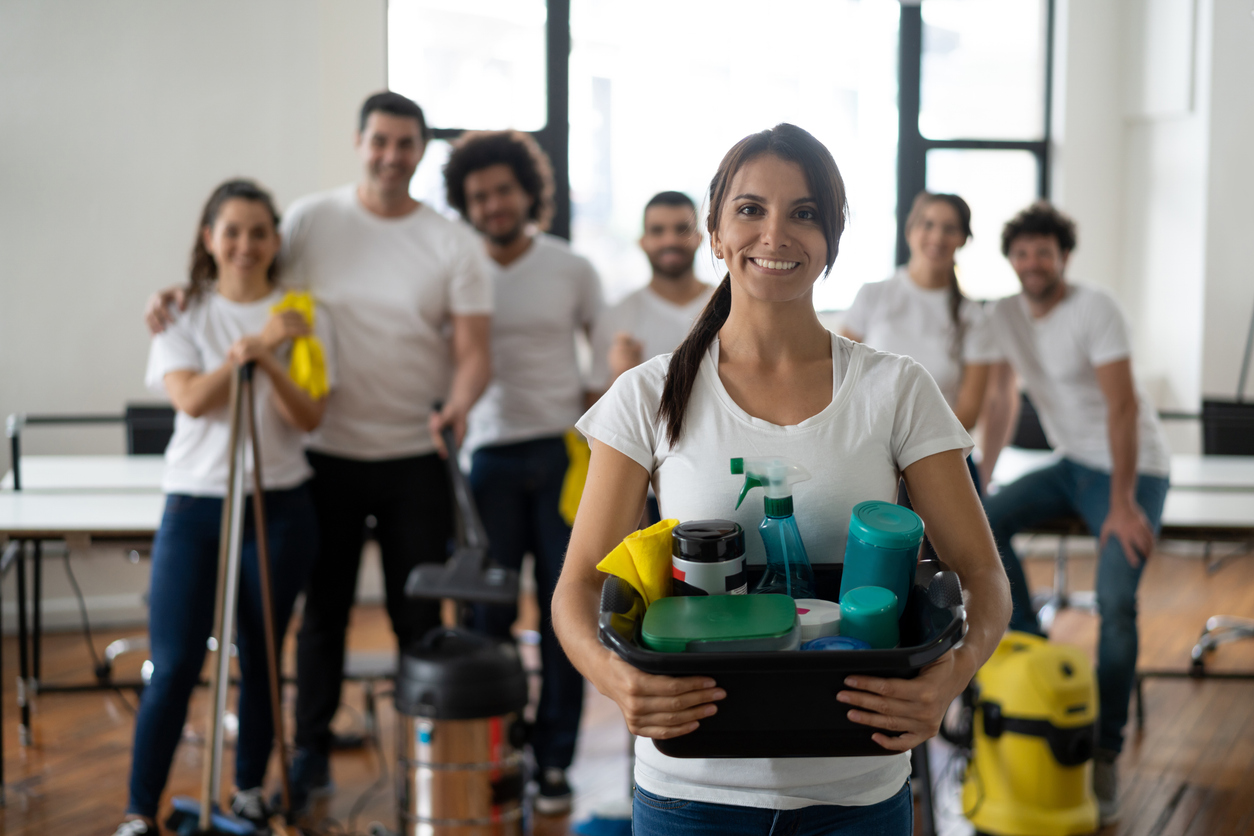 professional cleaners from a cleaning company at PMTO holding cleaning equipments